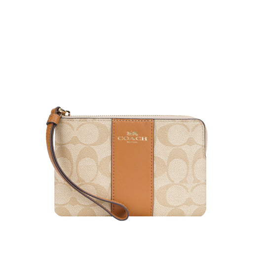 Coach Corner Zip Wristlet In Signature Canvas